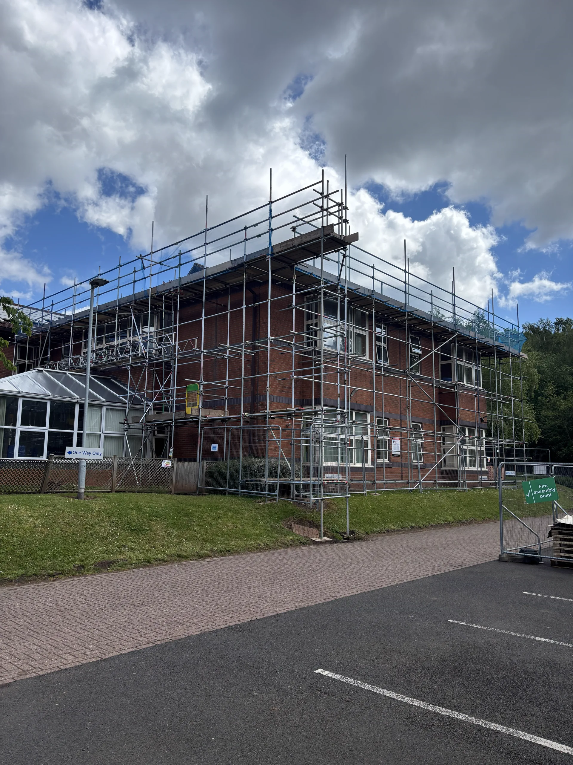 DR Access scaffolding installed around a working building